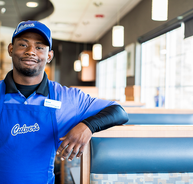 Worker standing in dining area